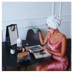 Collagen liquid 1000 ml. by BioTechUSA. A woman check magazine with collagen liquid.