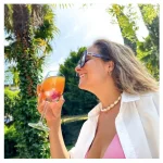 Clear Collagen Professional 350 gr. A woman drinks clear collagen professional, a product of BioTechUSA